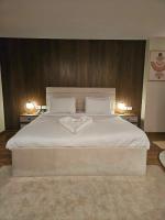 The Home Boutique Hotel Pyramids Inn客房内的一张或多张床位