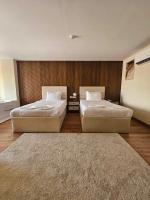 The Home Boutique Hotel Pyramids Inn客房内的一张或多张床位