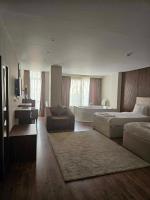 The Home Boutique Hotel Pyramids Inn客房内的一张或多张床位