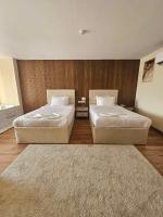 The Home Boutique Hotel Pyramids Inn客房内的一张或多张床位