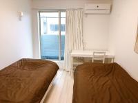 Ano House 女性専用Women's Guesthouse客房内的一张或多张床位