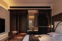 Rong Unique Hotel-Banyan Lake Scenery客房内的一张或多张床位