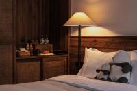 Rong Unique Hotel-Banyan Lake Scenery客房内的一张或多张床位