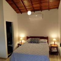 Chalés Vale dos Pássaros Refúgio nas montanhas客房内的一张或多张床位