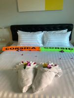 Lanta Corsica Hotel客房内的一张或多张床位