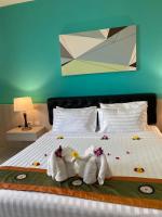 Lanta Corsica Hotel客房内的一张或多张床位