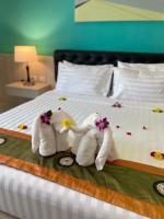 Lanta Corsica Hotel客房内的一张或多张床位