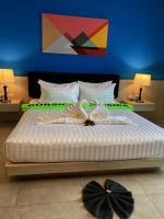 Lanta Corsica Hotel客房内的一张或多张床位
