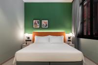 Citadines Connect Georgetown Penang客房内的一张或多张床位