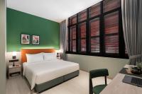 Citadines Connect Georgetown Penang客房内的一张或多张床位