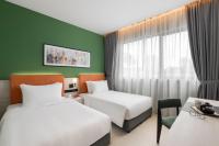 Citadines Connect Georgetown Penang客房内的一张或多张床位