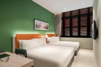Citadines Connect Georgetown Penang客房内的一张或多张床位