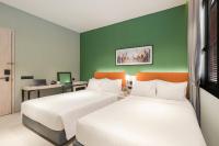 Citadines Connect Georgetown Penang客房内的一张或多张床位
