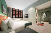 Citadines Connect Georgetown Penang客房内的一张或多张床位