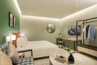 Citadines Connect Georgetown Penang客房内的一张或多张床位