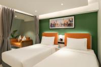 Citadines Connect Georgetown Penang客房内的一张或多张床位