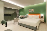 Citadines Connect Georgetown Penang客房内的一张或多张床位