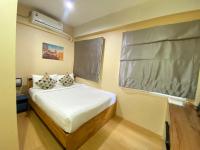 ซับรูมโฮเทล Subroom Hotel客房内的一张或多张床位