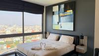 unixx seaview hotel客房内的一张或多张床位