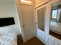 Flat Estaza Luxo Moema Ibirapuera com garagem piscina 202客房内的一张或多张床位