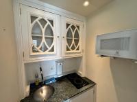 Flat Estaza Luxo Moema Ibirapuera com garagem piscina 202的厨房或小厨房