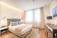 VIP Executive Picoas Hotel客房内的一张或多张床位