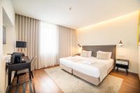 VIP Executive Picoas Hotel客房内的一张或多张床位