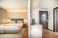 VIP Executive Picoas Hotel客房内的一张或多张床位