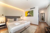 VIP Executive Picoas Hotel客房内的一张或多张床位