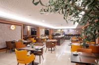 VIP Executive Picoas Hotel的电视和/或娱乐中心