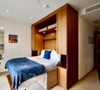 Bentley Holiday Apartments - West One客房内的一张或多张床位