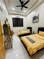 Mia homestay客房内的一张或多张床位