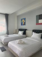 Lanta Corsica Hotel客房内的一张或多张床位