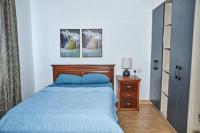 iFORA Homes- Stylish 3 Bedroom Condo near A&C Mall客房内的一张或多张床位