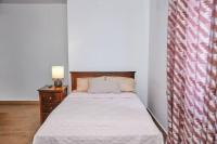iFORA Homes- Stylish 3 Bedroom Condo near A&C Mall客房内的一张或多张床位