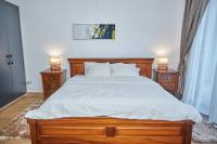iFORA Homes- Stylish 3 Bedroom Condo near A&C Mall客房内的一张或多张床位