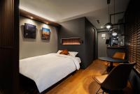 Tokyo Modern Stay Shinjuku客房内的一张或多张床位