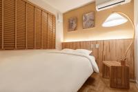 Tokyo Modern Stay Shinjuku客房内的一张或多张床位