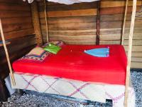 Ma jolie Cabane, 1 minute from the Indien Ocean客房内的一张或多张床位