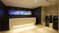 AB Hotel Shiojiri的电视和/或娱乐中心