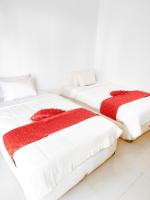 Ceria House Ungasan Uluwatu客房内的一张或多张床位