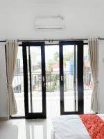 Ceria House Ungasan Uluwatu客房内的一张或多张床位