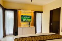 Uma Jala Villa Ubud客房内的一张或多张床位