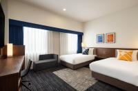 Four Points Flex by Sheraton Nagoya Station客房内的一张或多张床位