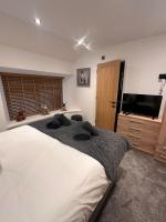 Abbys Cottage客房内的一张或多张床位