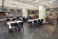 Elysee Rive Hotel餐厅或其他用餐的地方