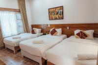 Jungle Safari Lodge- Serenity in the Wild客房内的一张或多张床位