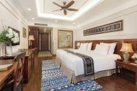 Silk Path Grand Sapa Resort & Spa客房内的一张或多张床位