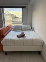Lovely condo next to European Area客房内的一张或多张床位