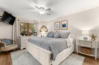 Fairways 228 &quot;Bluegrass Bungalow&quot;客房内的一张或多张床位